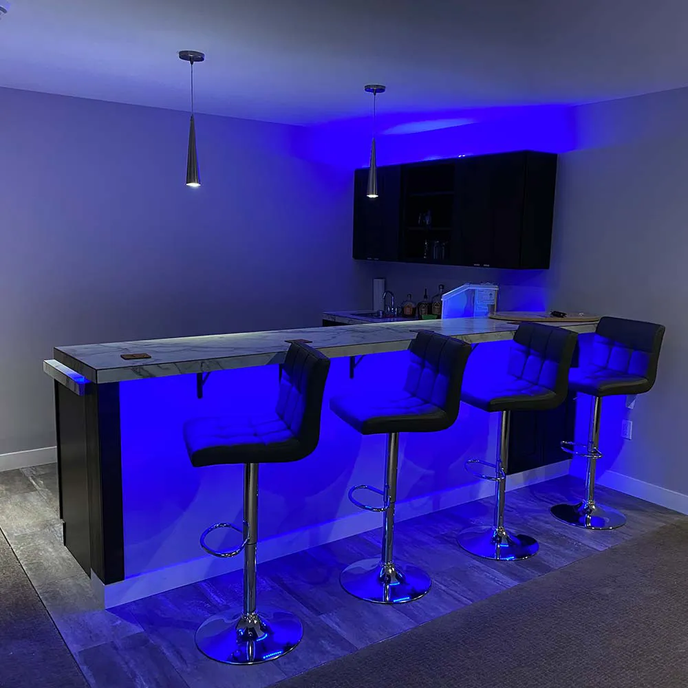 Purple mood lighting in a newly remodeled basement