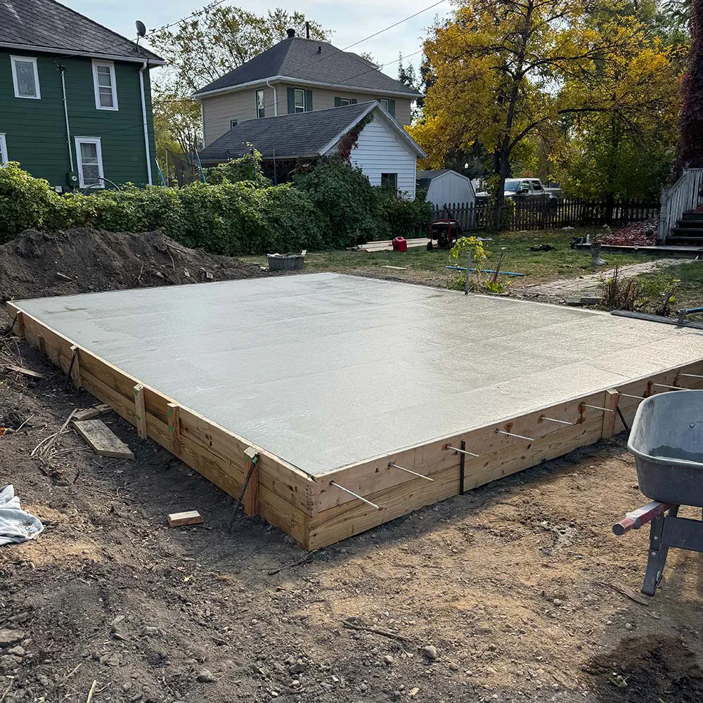 A new concrete pad installed by a professional concrete contractor