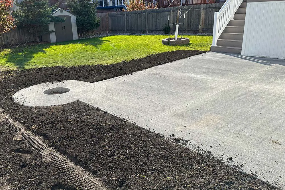 A freshly poured backyard patio demonstrating quality flat work